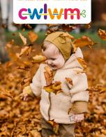 Chil playing in leaves